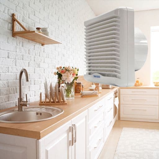 modern, bright kitchen, with an image of an extractor fan overlaid